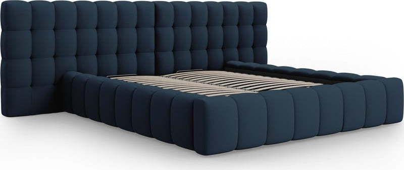 Tmavě modrá čalouněná dvoulůžková postel s úložným prostorem a roštem 180x200 cm Mamaia – Micadoni Home Micadoni